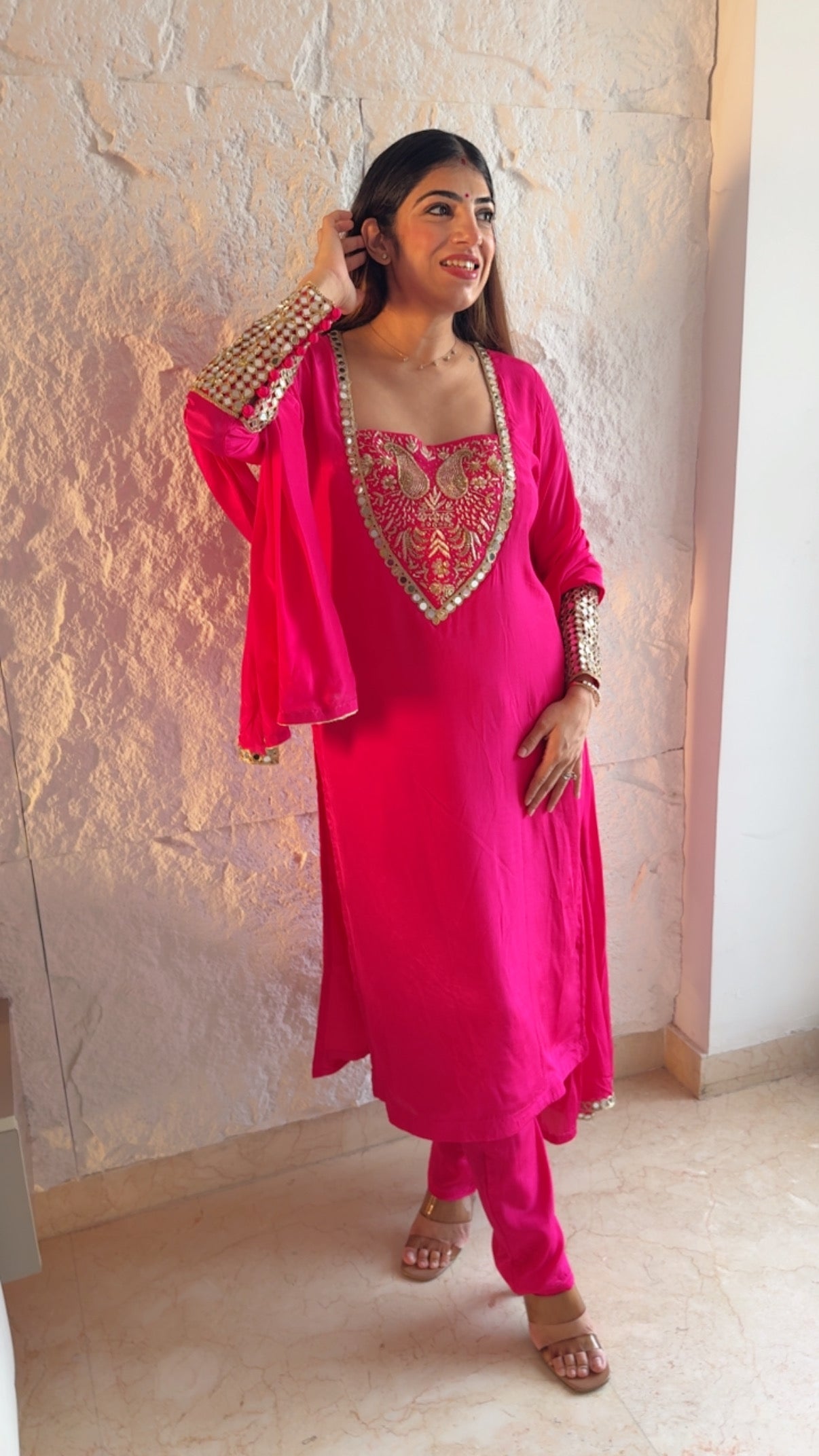 Pure crepe 3 pc suit with complete handwork on neck line and real mirror detailing on sleeves with potli buttons