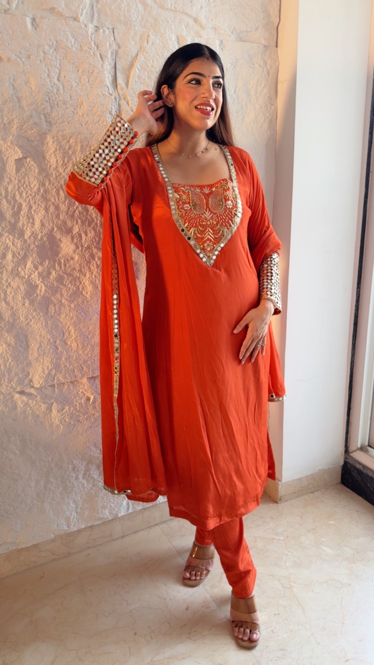 Pure crepe 3 pc suit with complete handwork on neck line and real mirror detailing on sleeves with potli buttons