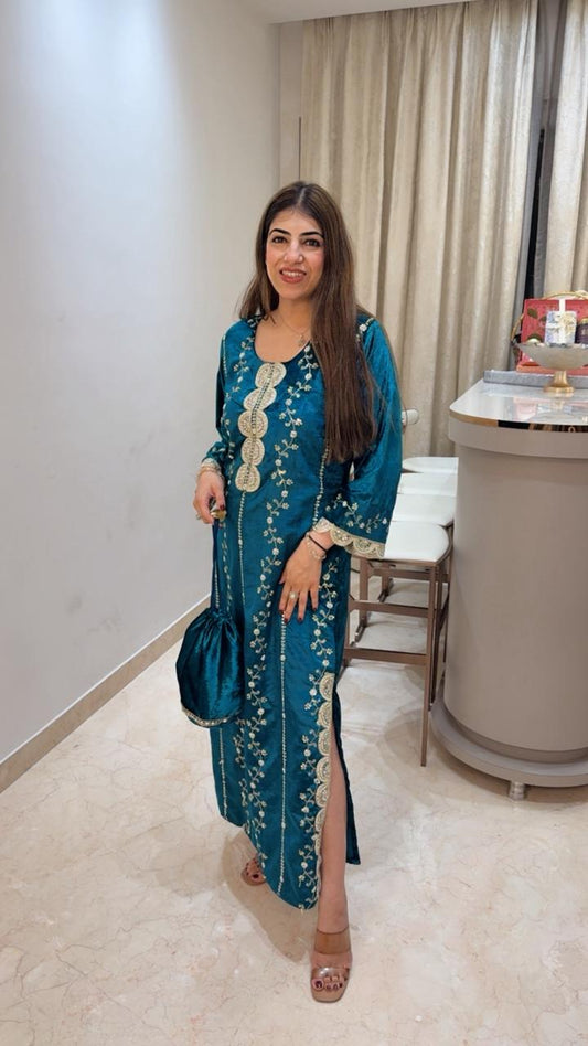 Imported velvet dress with side slit with potli bag