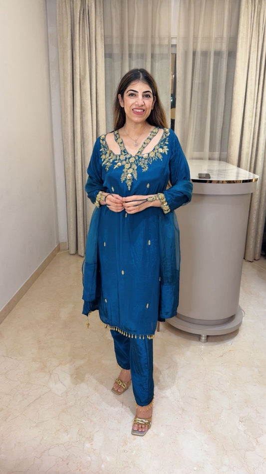 Crepe suit with complete handwork with designer neck line and sleeve paired with organza duppatta