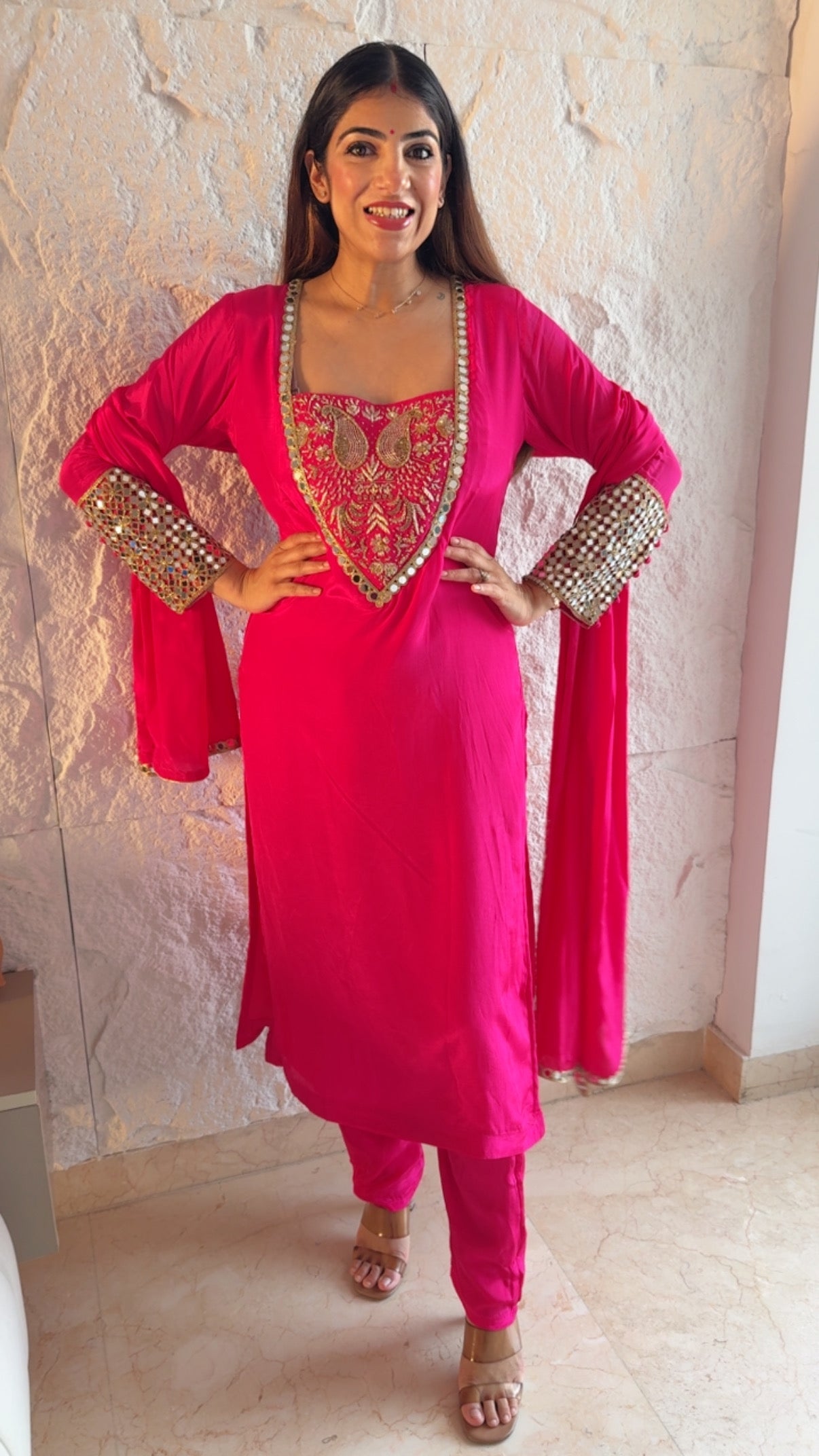 Pure crepe 3 pc suit with complete handwork on neck line and real mirror detailing on sleeves with potli buttons