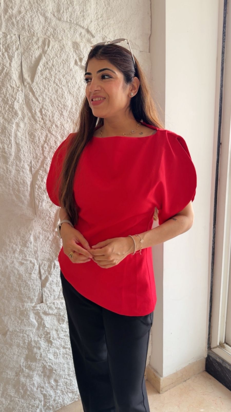 Imported fabric boat beck top with puff sleeves and slit details.
