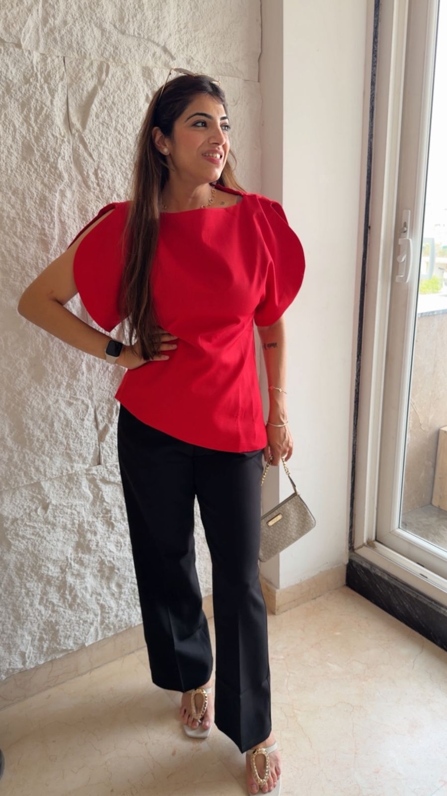 Imported fabric boat beck top with puff sleeves and slit details.