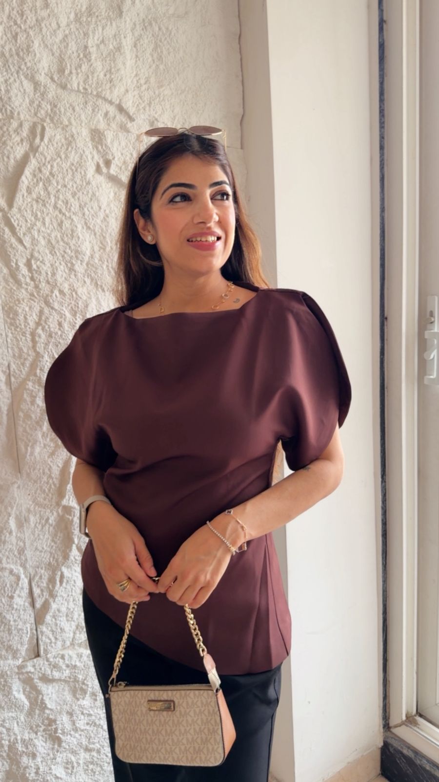 Imported fabric boat beck top with puff sleeves and slit details.
