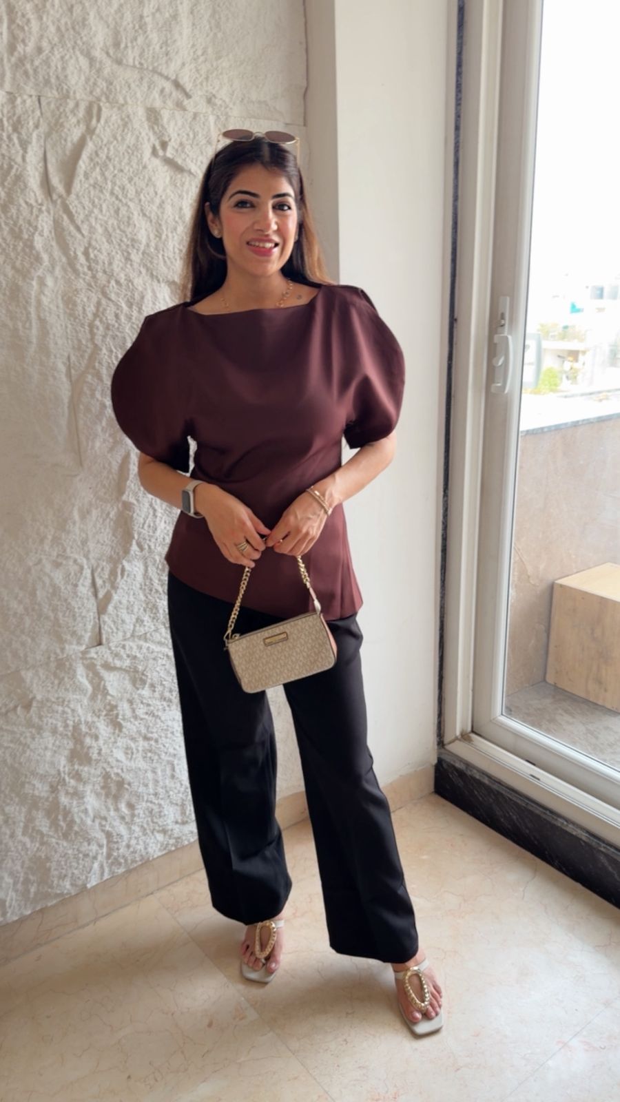 Imported fabric boat beck top with puff sleeves and slit details.
