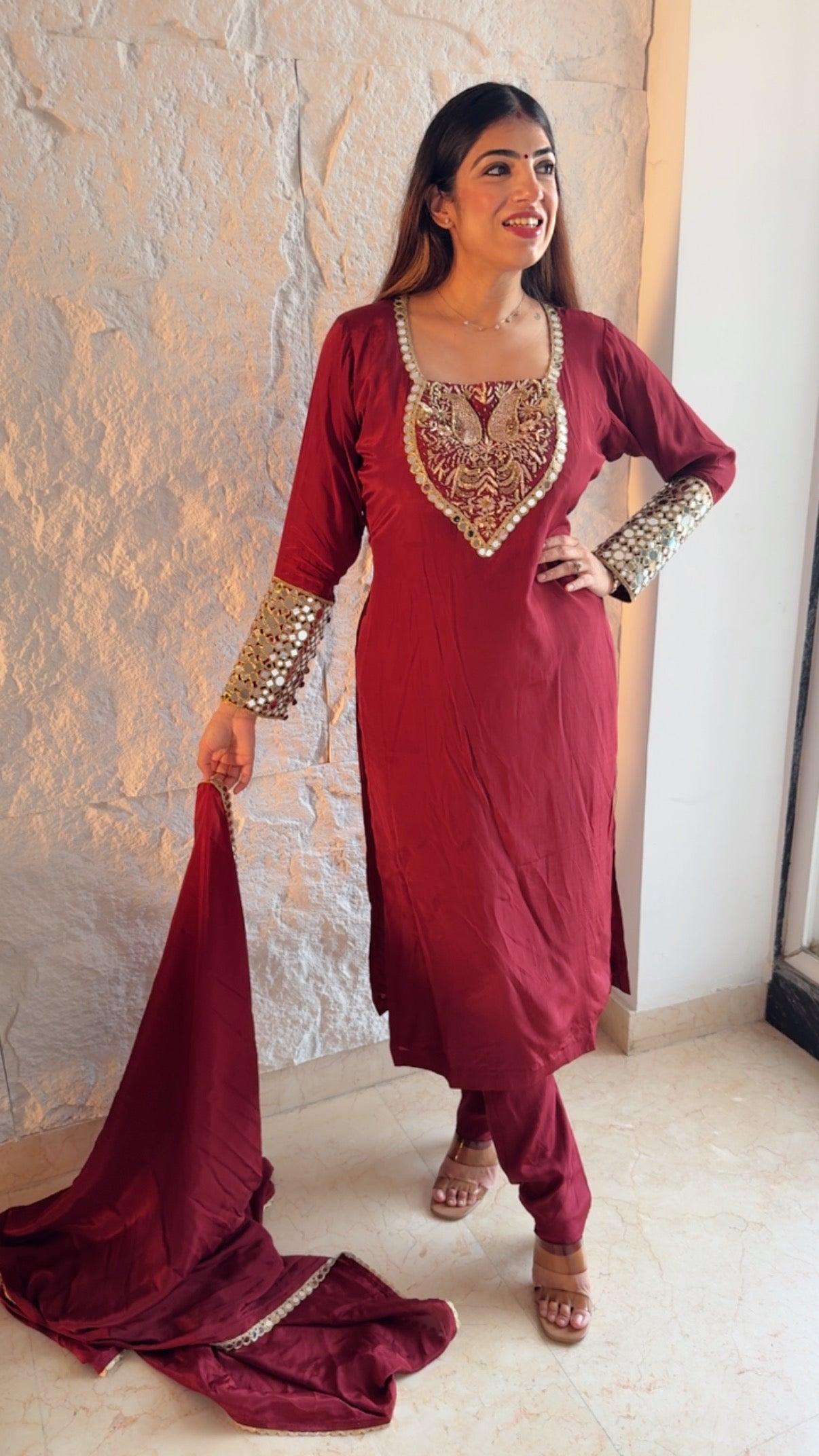 Pure crepe 3 pc suit with complete handwork on neck line and real mirror detailing on sleeves with potli buttons