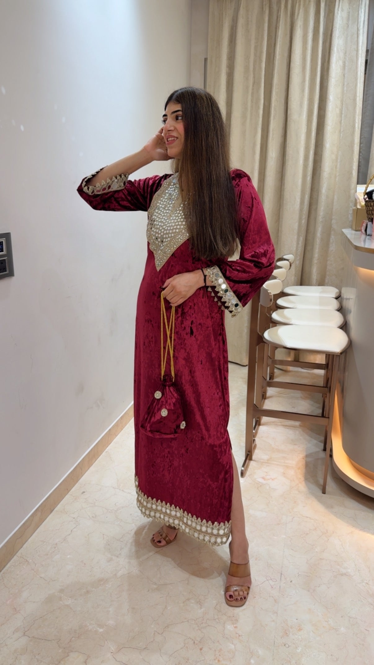 Valvet long dress-side slit cut design with potli bag