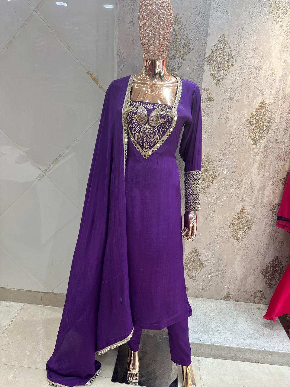 Pure crepe 3 pc suit with complete handwork on neck line and real mirror detailing on sleeves with potli buttons