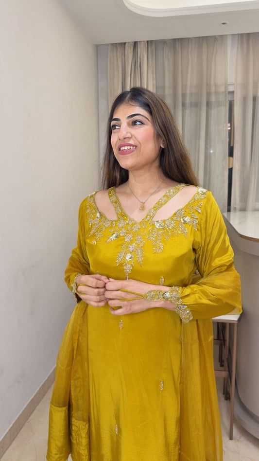 Crepe suit with complete handwork with designer neck line and sleeve paired with organza duppatta