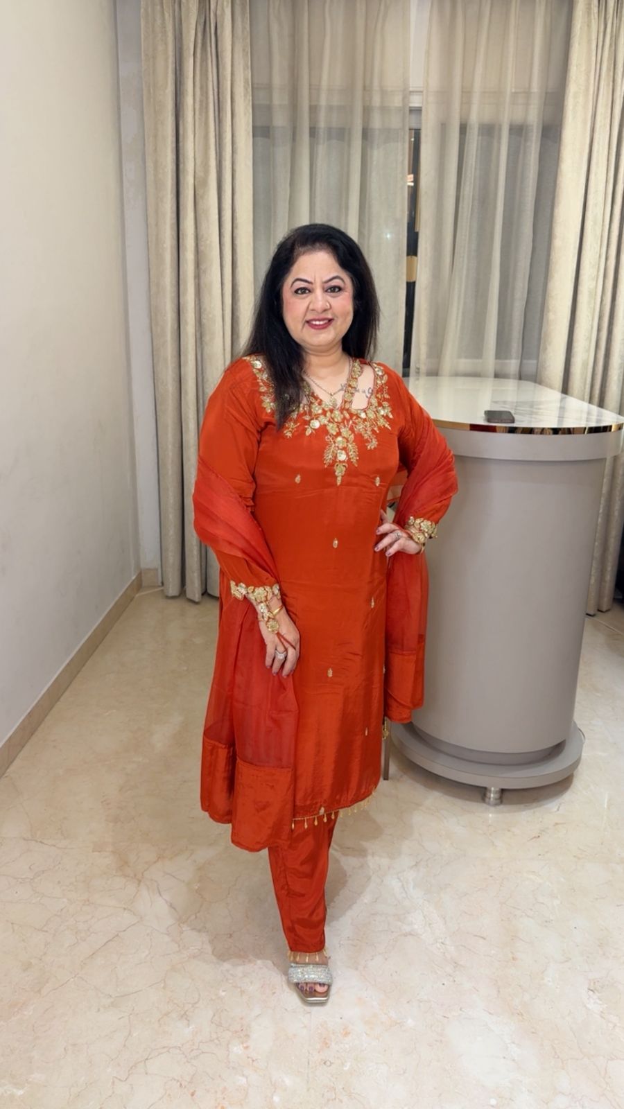 Crepe suit with complete handwork with designer neck line and sleeve paired with organza duppatta