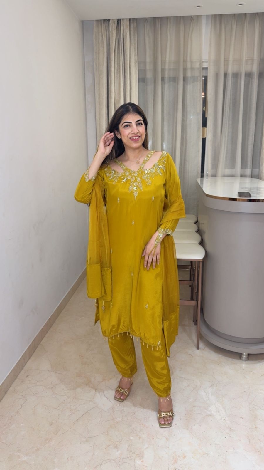 Crepe suit with complete handwork with designer neck line and sleeve paired with organza duppatta