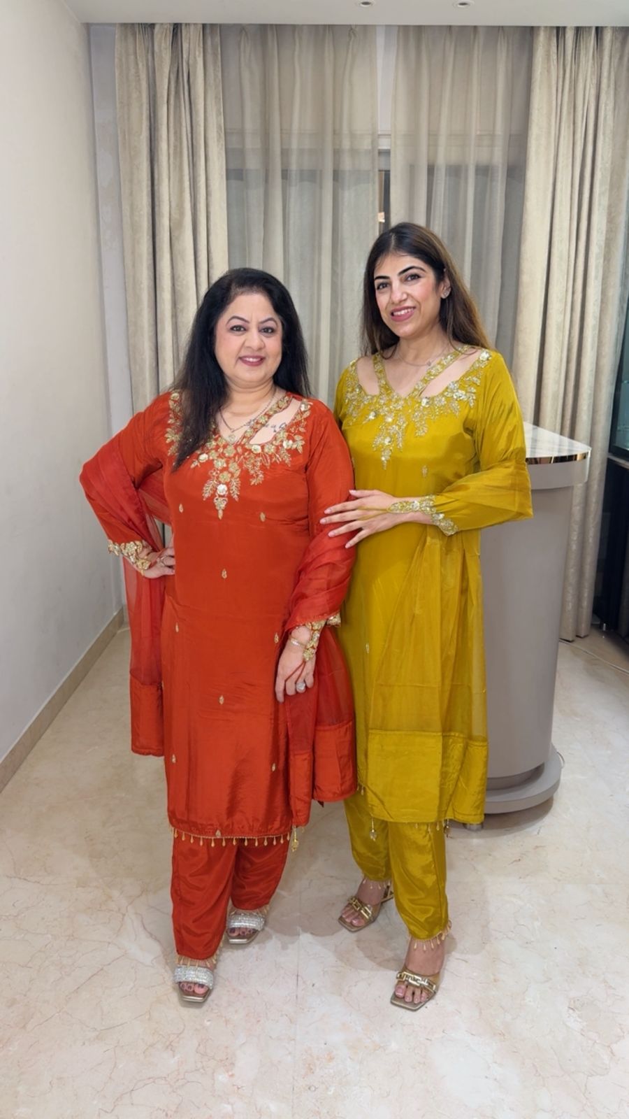 Crepe suit with complete handwork with designer neck line and sleeve paired with organza duppatta